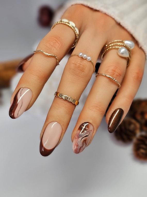 Get inspired with over 50 breathtaking brown nail designs for the season!